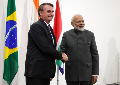 Bolsonaro e Modi, na foto, ao lado de Trump, formam a trinca do populismo de direita global, agora na liderana do ranking de contaminados pela covid (Crdito: Mikhail Klimentyev/AFP)
