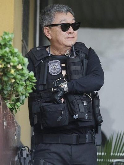 28.nov.2015 - O agente federal Newton Ishii, conhecido como Japons da Federal Imagem: Giuliano Gomes/Folhapress